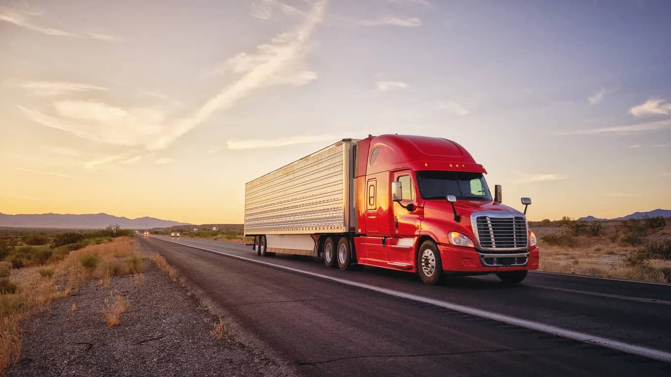Commercial diesel mechanic performing On-Site Diagnostics & Repair on a heavy-duty truck